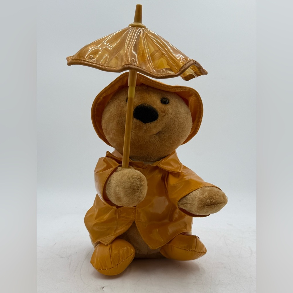 T.L. Toys Animated Singing In The Rain bear Yellow Raincoat 10.5".